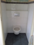 Betegeling toilet